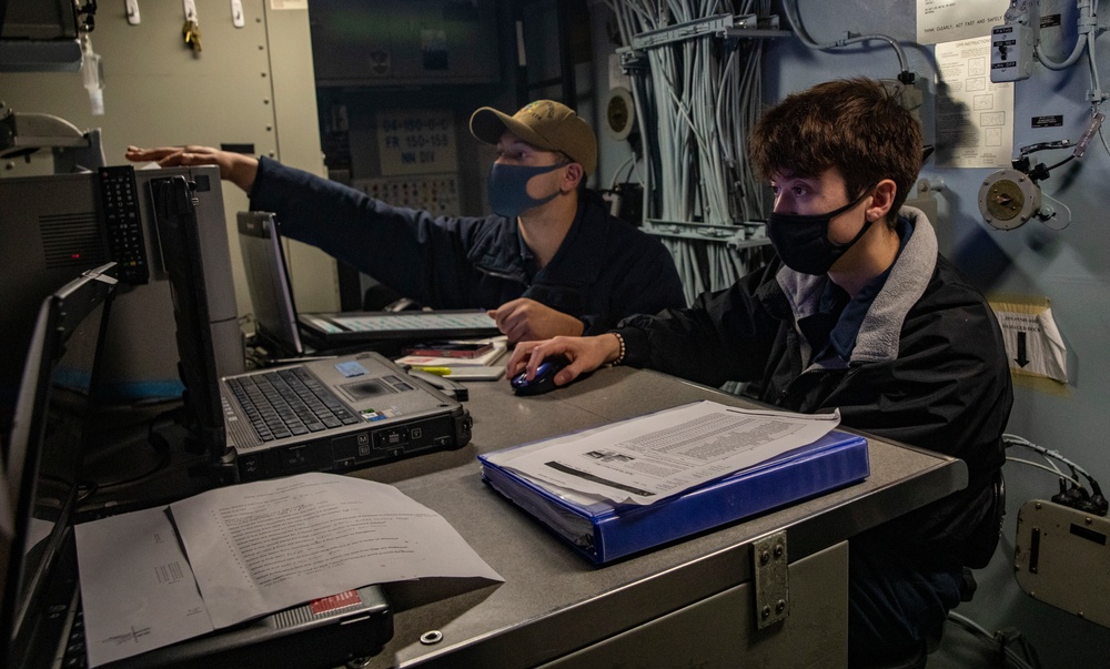 Sailors Aboard USS Ralph Johnson (DDG 114) Conduct Bridge Operations