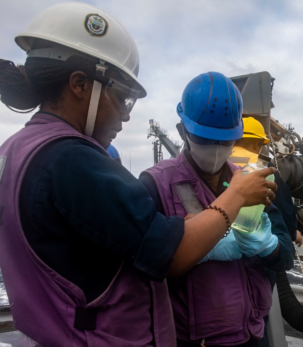 Sailors Aboard USS Ralph Johnson Conduct Replenishment-at-Sea with USNS Guadalupe (T-AO-200)