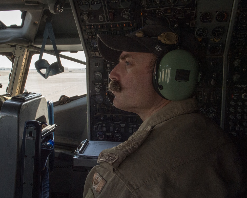 E-3 sentry flight engineer prepares for flight