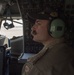 E-3 sentry flight engineer prepares for flight