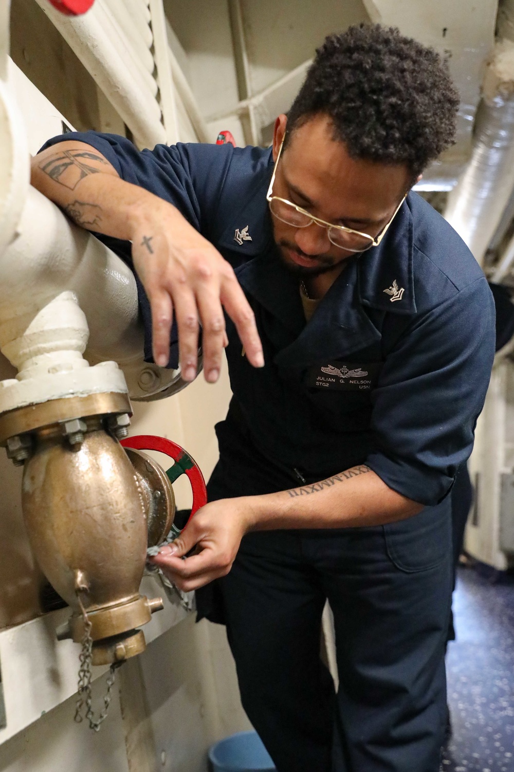DVIDS Images USS Ross Sailors polish brass equipment [Image 3 of 8]