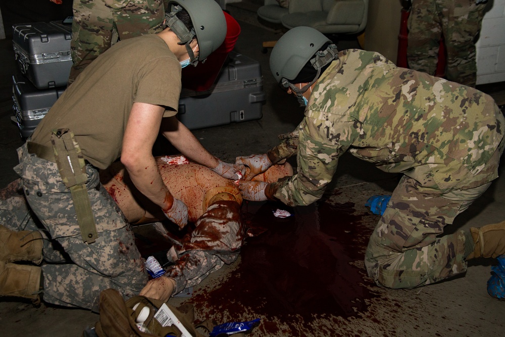 Members form the 382nd Military Police Battalion testing on the Combat Lifesaving skills