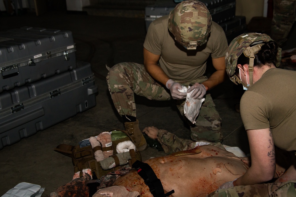 Members form the 382nd Military Police Battalion testing on the Combat Lifesaving skills they just learned.