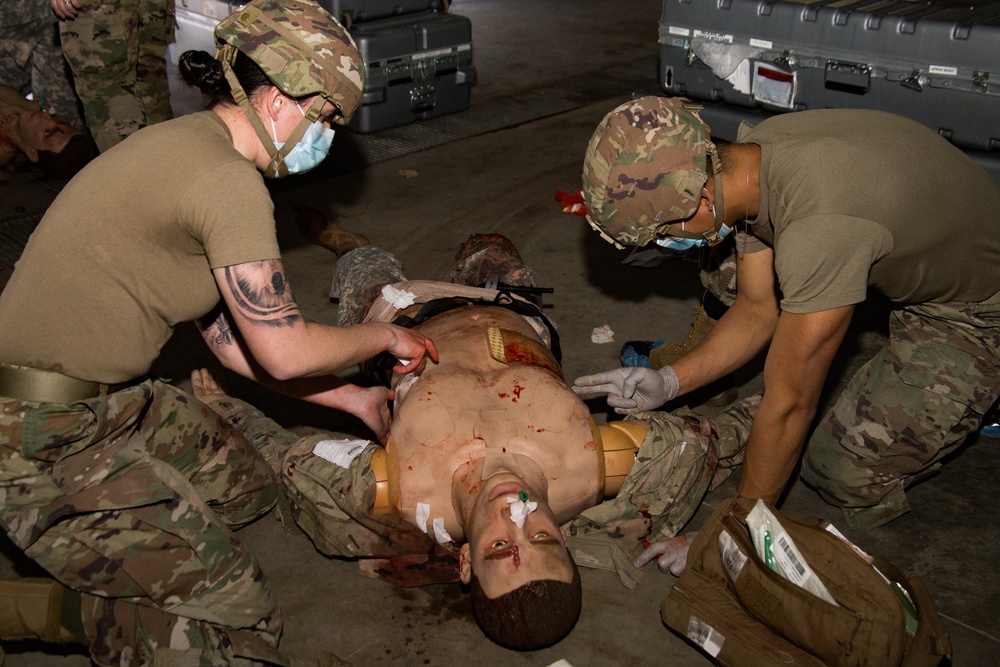 Members form the 382nd Military Police Battalion test on the Combat Lifesaving skills