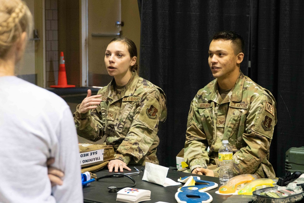 Airmen seek recruits at career fair