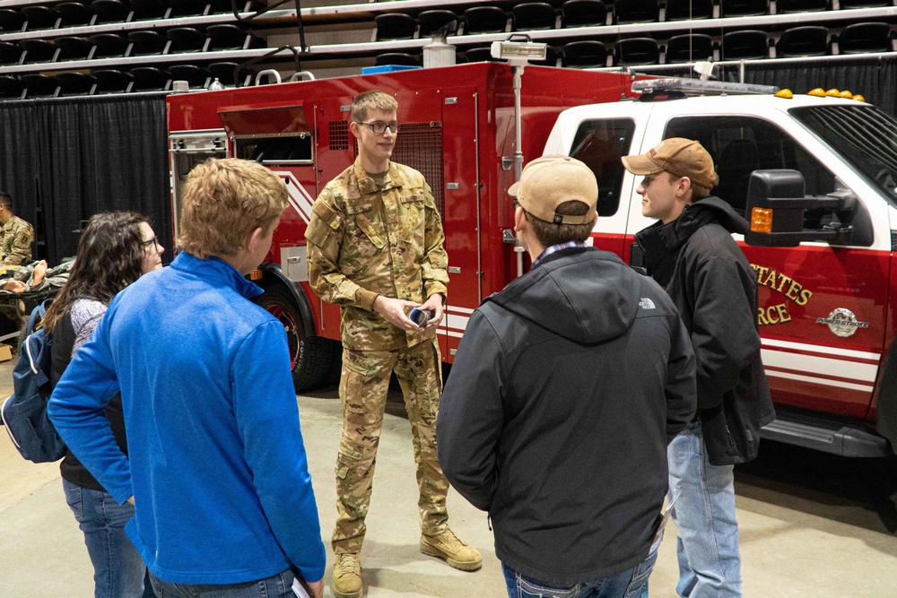 Airmen seek recruits at career fair