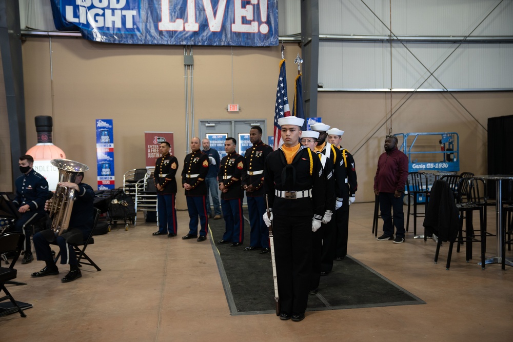 Admiral Provides Oath of Enlistment to Recruits at Rodeo