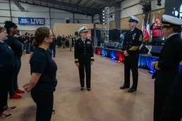 Admiral Provides Oath of Enlistment to Recruits at Rodeo
