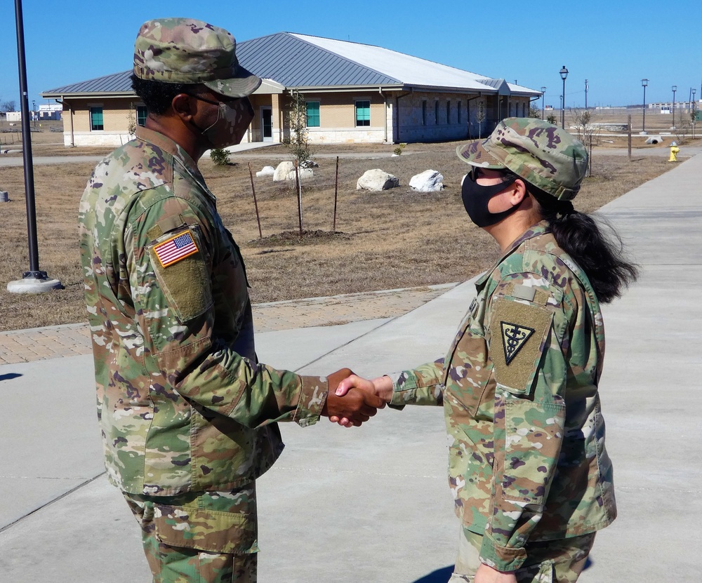 SPC Lydia Delgado of the 3D Medical Command Deployment Support Detachment 11 promotes to SGT.