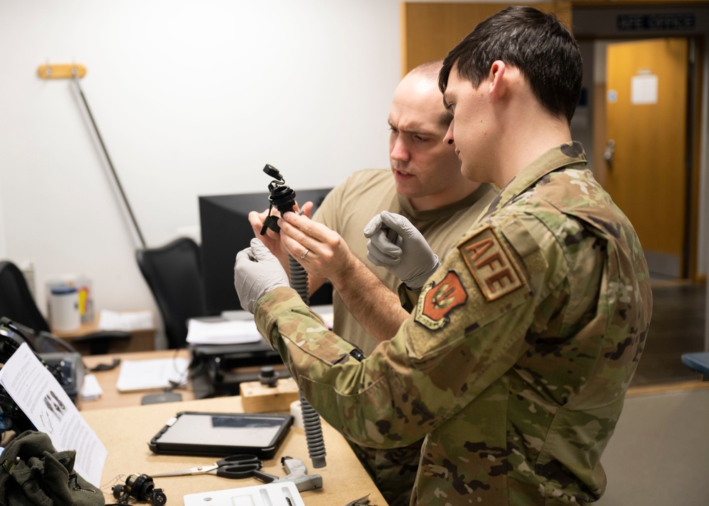 100th OSS prepare and test flight equipment