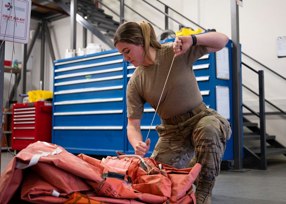 100th OSS prepare and test flight equipment