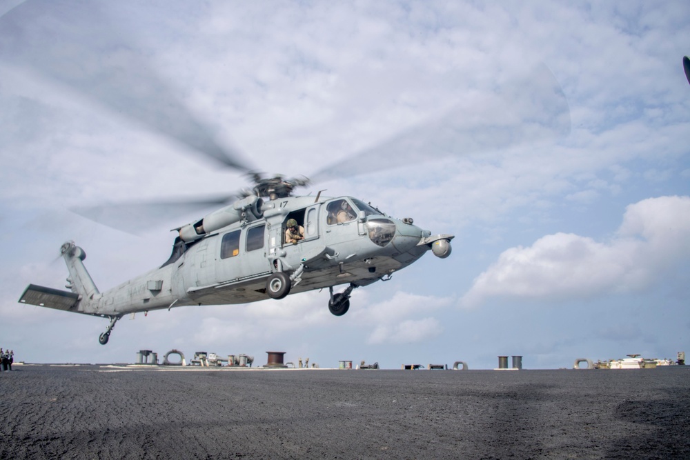 Aircraft lands on flight deck aboard USS Gonzalez.