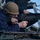 Sailor fires M240B machine gun during a live-fire event aboard USS Gonzalez. Sailor fires M240B machine gun during a live-fire event aboard USS Gonzalez.