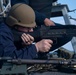 Sailor fires M240B machine gun during a live-fire event aboard USS Gonzalez.