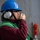 Sailor communicates through sound powered telephone during a replenishment-at-sea. Sailor communicates through sound powered telephone during a replenishment-at-sea.