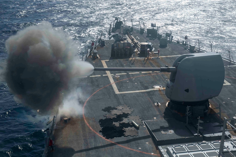 5-inch gun fires from USS Gonzalez during a live-fire event.