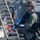 Sailor holds perimeter during a VBSS training evolution. Sailor holds perimeter during a VBSS training evolution.