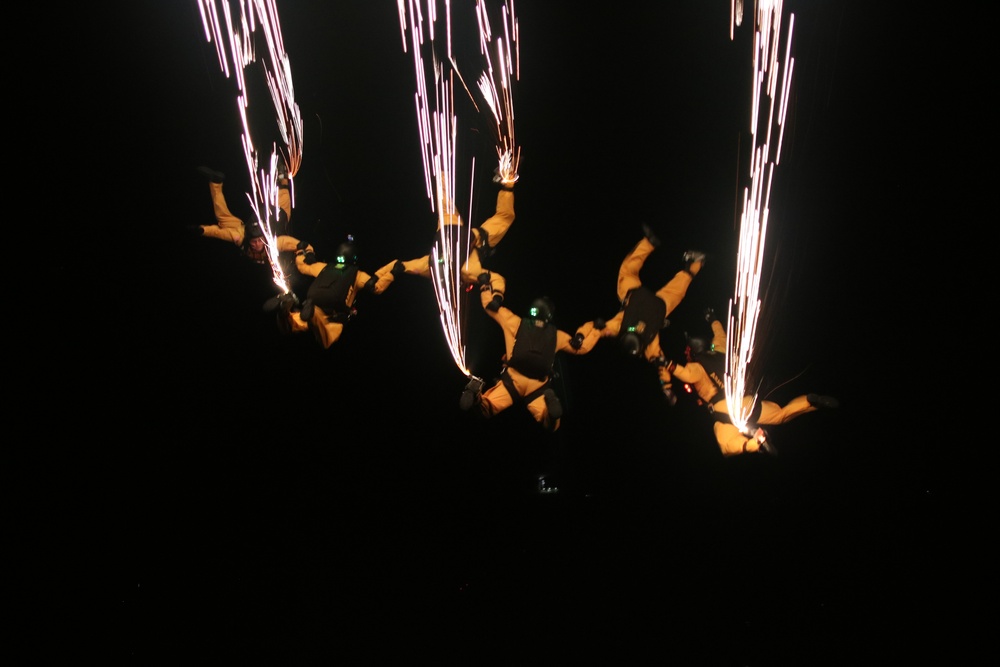 U.S. Army Parachute Team conducts night jumps