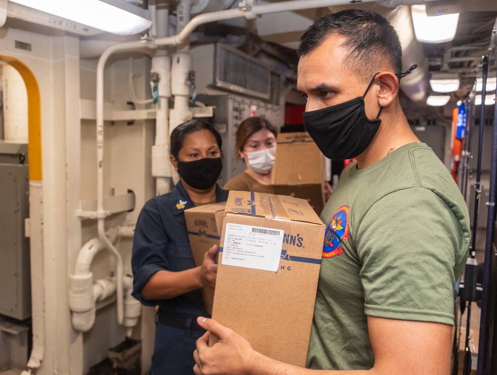 DVIDS - Images - USS Portland (LPD 27) Resupplies in Guam [Image 1 of 3]