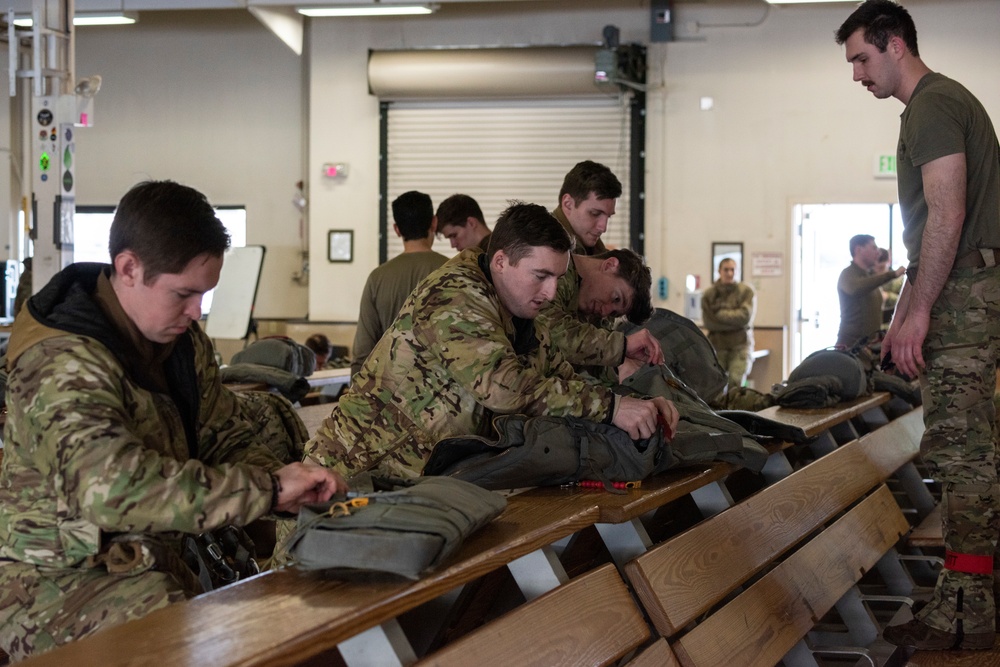 Air Force special warfare Airmen gear up for airborne operations at JBER