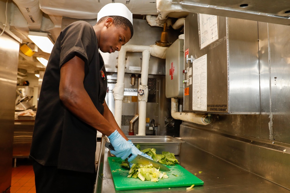 Abraham Lincoln Sailors prepare food