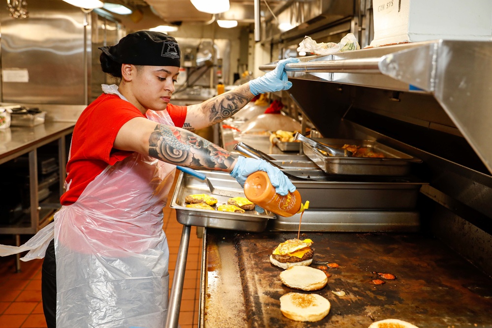 Abraham Lincoln Sailors prepare food