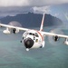 Coast Guard Air Station Barbers Point HC-130 flys over Hawaiian Islands