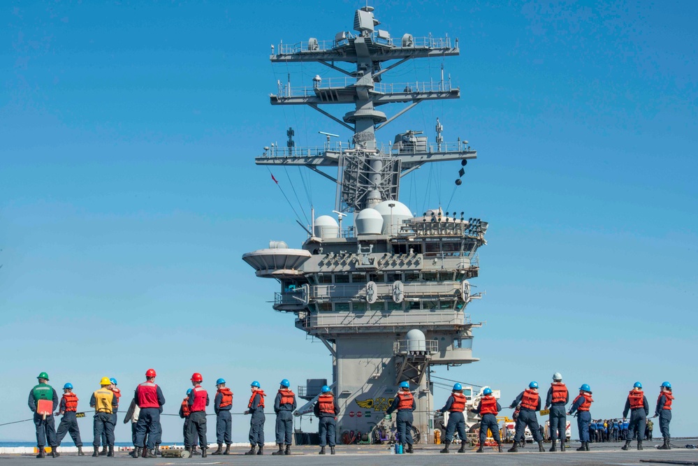 Sailors Heave Lines During A Replenishment At Sea