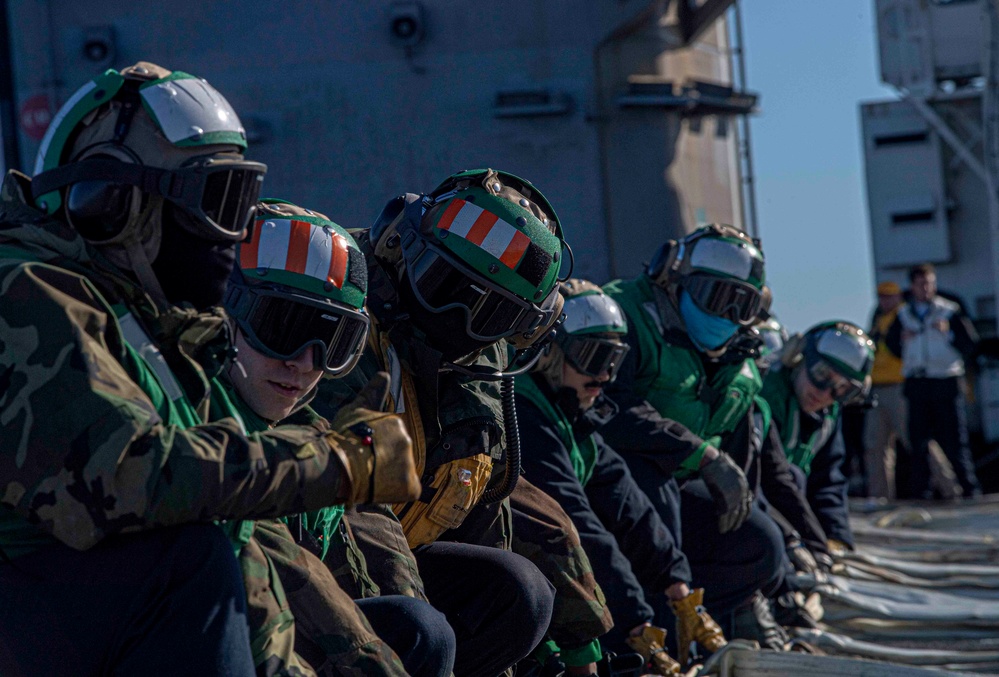 Sailors Work On Landing Equipment