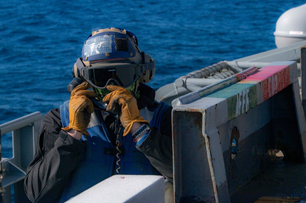 Sailor Participates In A General Quarters Drill