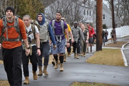 USARIEM marches with over 800 pounds of canned goods for food drive