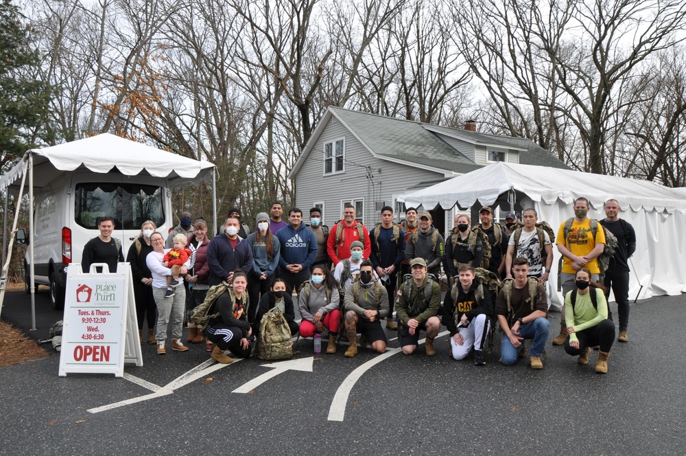 USARIEM marches with over 800 pounds of canned goods for food drive