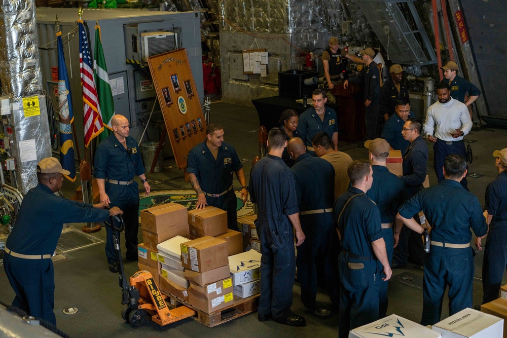 USS Jackson (LCS 6) Sailors Move Supplies