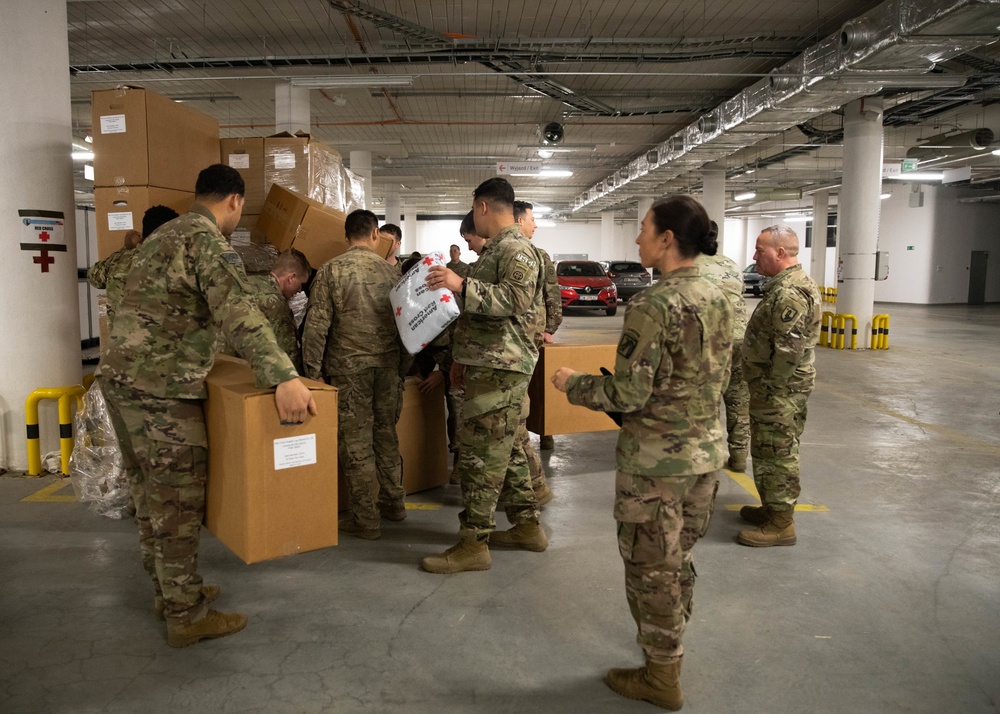 Paratroopers assist USAID with delivery of humanitarian assistance items