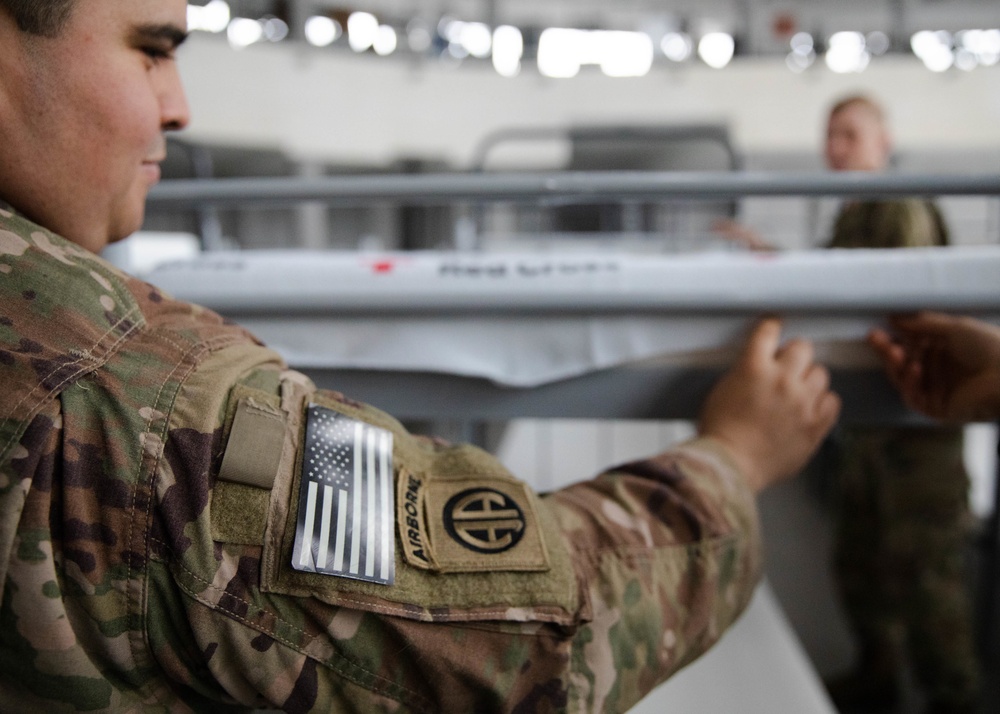 Paratroopers assist USAID with delivery of humanitarian assistance items