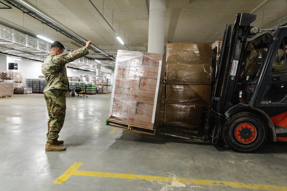 Paratroopers assist USAID with delivery of humanitarian assistance items