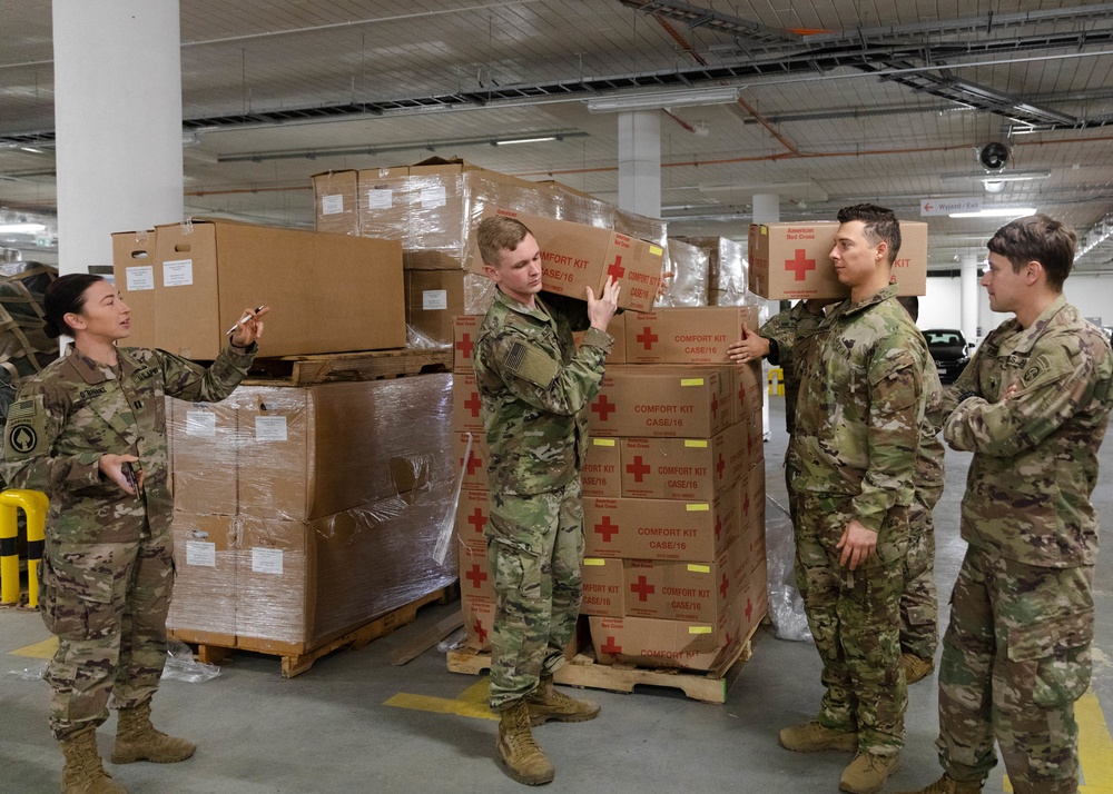 Paratroopers assist USAID with delivery of humanitarian assistance items