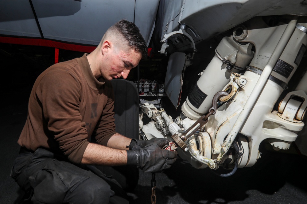 Abraham Lincoln Sailors conduct aircraft maintenance