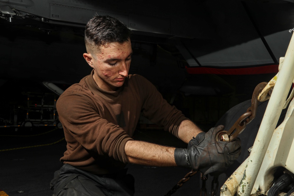 Abraham Lincoln Sailors conduct aircraft maintenance