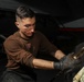 Abraham Lincoln Sailors conduct aircraft maintenance