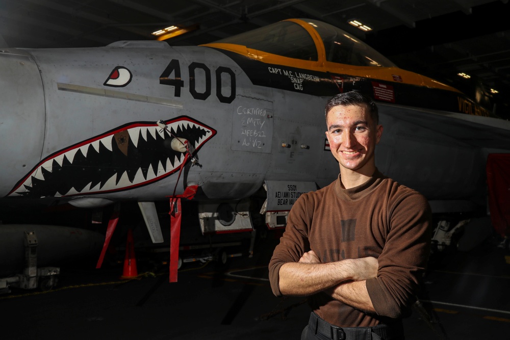 Abraham Lincoln Sailors conduct aircraft maintenance