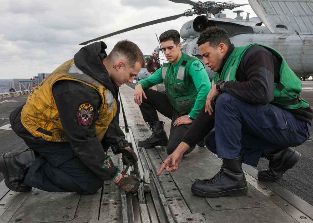 Abraham Lincoln Sailors conduct maintenance