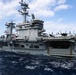 Abraham Lincoln conducts a replenishment-at-sea with Mobile Bay