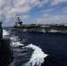 Abraham Lincoln conducts a replenishment-at-sea with Mobile Bay