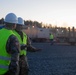 Soldiers and civilians assigned to 624th Movement Control Team download equipment at Grafenwoehr Training Area