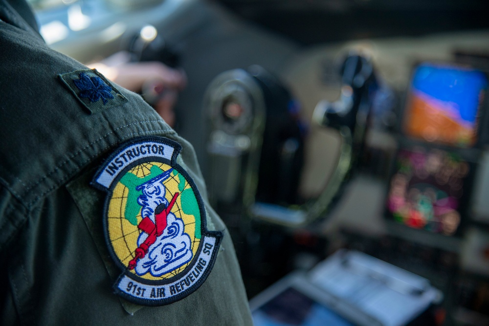 91st Air Refueling Squadron preforms Grand Prix flyover