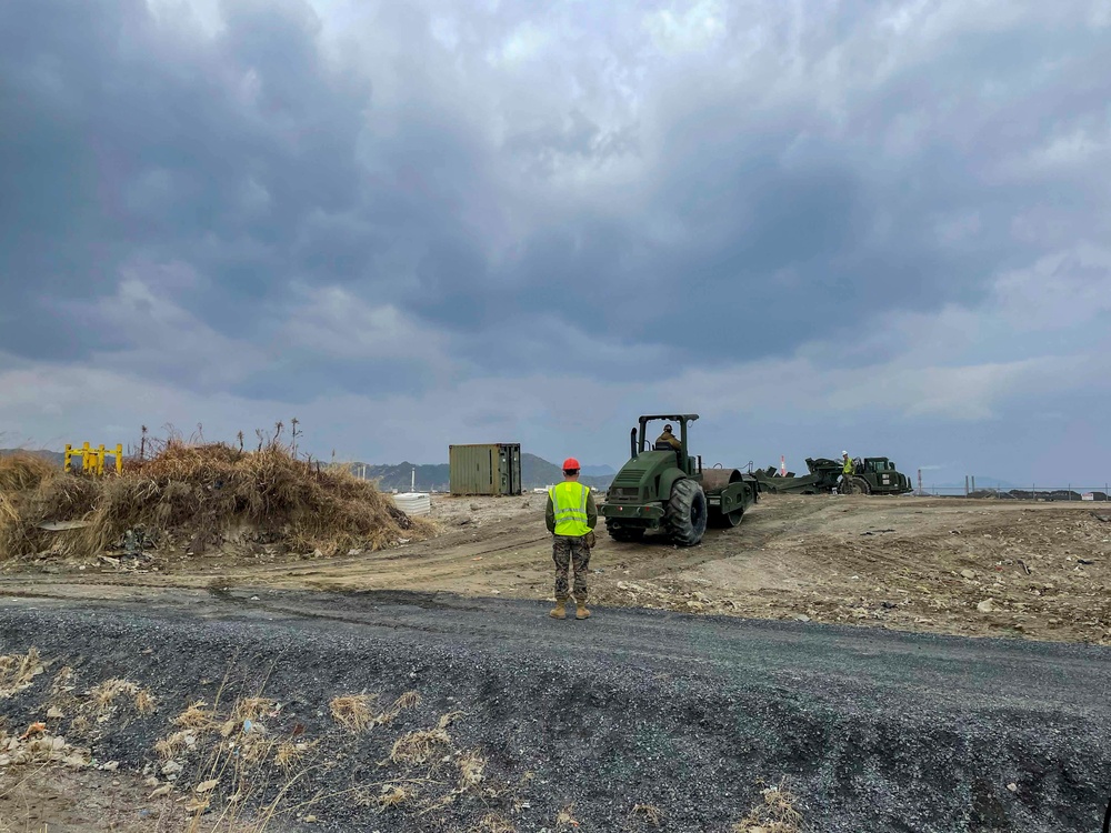 NMCB THREE Detail Iwakuni transports roller across BASH project site