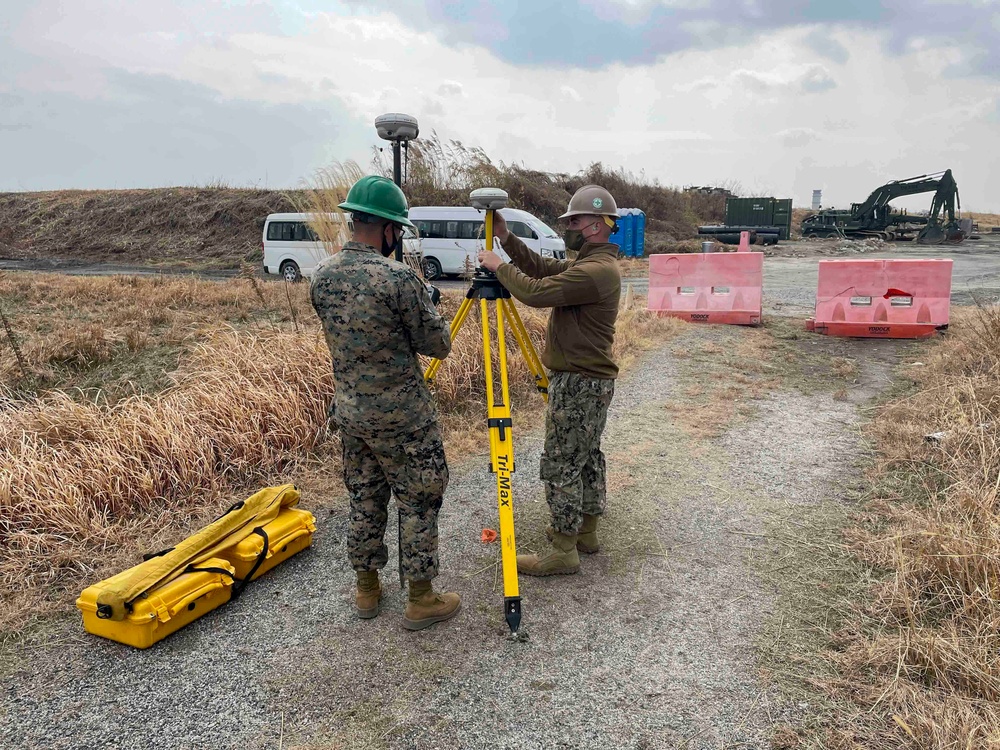 NMCB THREE Detail Iwakuni Seabee teaches 9th ESB Marine on proper use of R8 Trimble Survey System