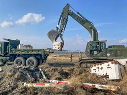 9th ESB and MWSS 172 Marines with NMCB THREE Seabees work cohesively to remove metal and concrete barriers on BASH project site