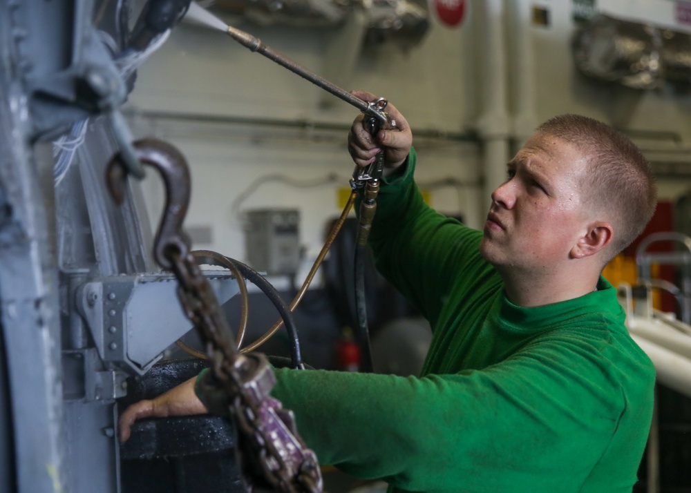 Abraham Lincoln Sailors conduct aviation maintenance